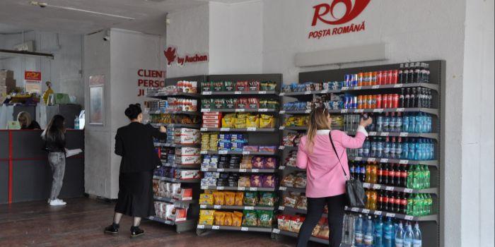 Oficii postale cu supermarket. Posta Romana a incheiat un parteneriat cu Auchan pentru vanzarea de produse in oficiile din tara